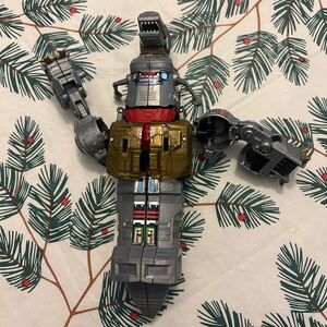 This is a Transformers Generations Power of the Primes Voyager Class Grimlock